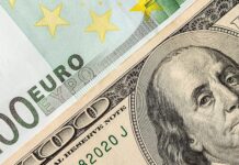 Dolarul trece pentru prima dată în istorie de 5.1 lei